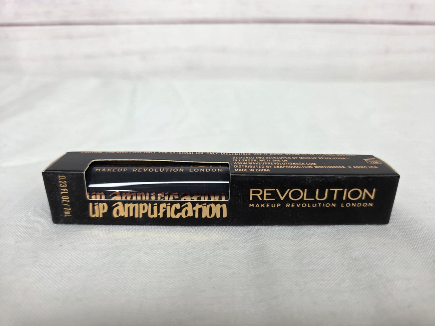 REVOLUTION Limitless Lip Amplification Lip Gloss